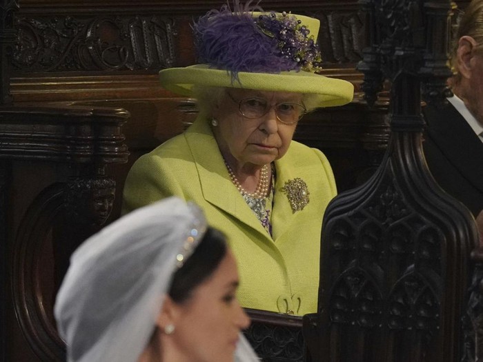 Queen Elizabeth II looks on during the wedding of Prince Harry and Meghan Markle at St Georges Chapel, Windsor Castle, Saturday May 19, 2018. (Jeff J Mitchell/PA via AP)