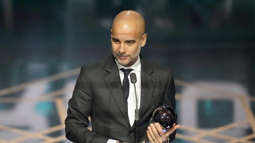 Manchester Citys coach Pep Guardiola accepts the Best Mens Coach award during the FIFA Football Awards 2023 at the Eventim Apollo in Hammersmith, London, Monday, Jan. 15, 2024. (AP Photo/Kirsty Wigglesworth)