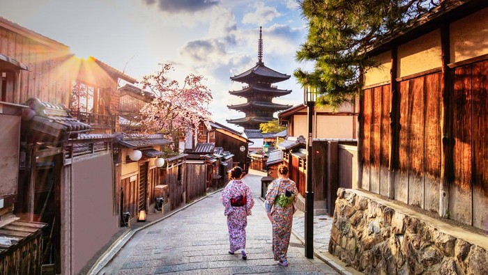 Kyoto - Japan - April 9, 2017:Yasaka Pagoda and Sannen Zaka Street, Kyoto, Japan. Tourists wander down the narrow streets of the Higashiyama District neighbourhood in Kyoto, Japan