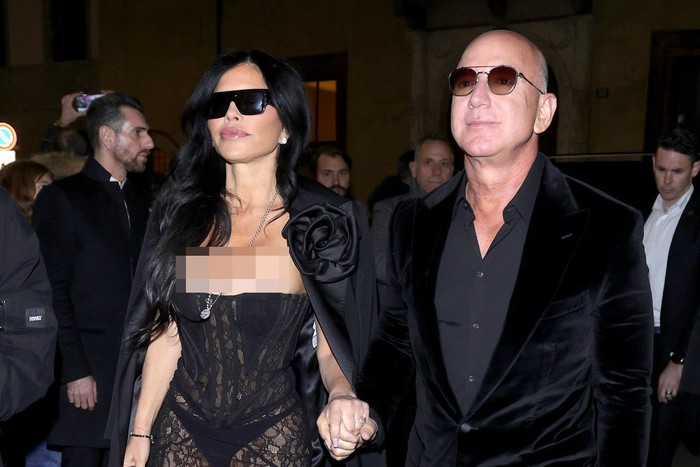 MILAN, ITALY - JANUARY 13: Jeff Bezos and wife Lauren Sanchez are seen during the Milan Fashion Week - Menswear Fall/Winter 2024-2025 on January 13, 2024 in Milan, Italy. (Photo by Robino Salvatore/GC Images)