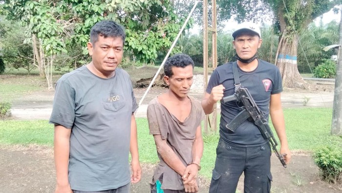 Pelaku penganiaya sekuriti PTPN 3 di Sergai saat ditangkap. (Istimewa)