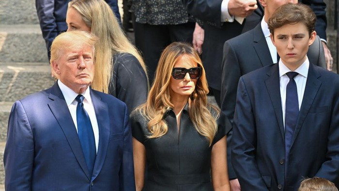 NEW YORK, NEW YORK - JULY 20:  Former U.S. President Donald Trump, former U.S. First Lady Melania Trump and Barron Trump are seen at the funeral of Ivana Trump on July 20, 2022 in New York City.  (Photo by James Devaney/GC Images)
