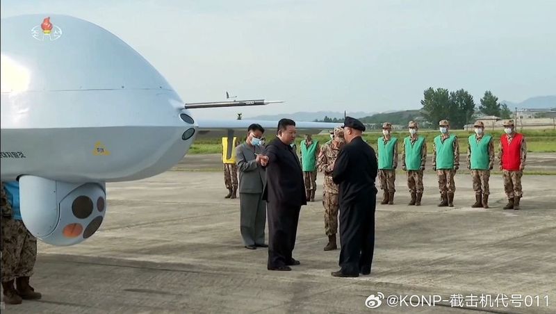 Kom Jong Un dengan drone
