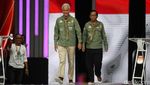 Potret Busana Pasangan Capres-Cawapres di Debat Keempat