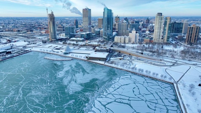 An aerial view of the downtown covered in snow, in Milwaukee, Wisconsin, U.S., January 18, 2024, in this picture obtained from a social media video. Isaac Rowlett Media/via REUTERS  THIS IMAGE HAS BEEN SUPPLIED BY A THIRD PARTY. MANDATORY CREDIT. NO RESALES. NO ARCHIVES.