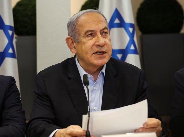 Israeli Prime Minister Benjamin Netanyahu speaks during the weekly cabinet meeting at the Defence Ministry in Tel Aviv, Israel, January 7, 2024. REUTERS/Ronen Zvulun/Pool/File Photo Acquire Licensing Rights