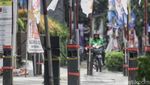 Waduh! Stand Bollard Trotoar Dipasangi APK Parpol