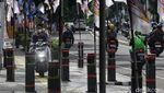 Waduh! Stand Bollard Trotoar Dipasangi APK Parpol