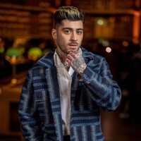 Sebelum eksis kembali, Zayn Malik terakhir kali terlihat melenggang di red carpet pada Mei 2019, saat premiere film ‘Aladdin’ versi live-action di Los Angeles, AS. Foto: Swan Gallet/WWD via Getty Images