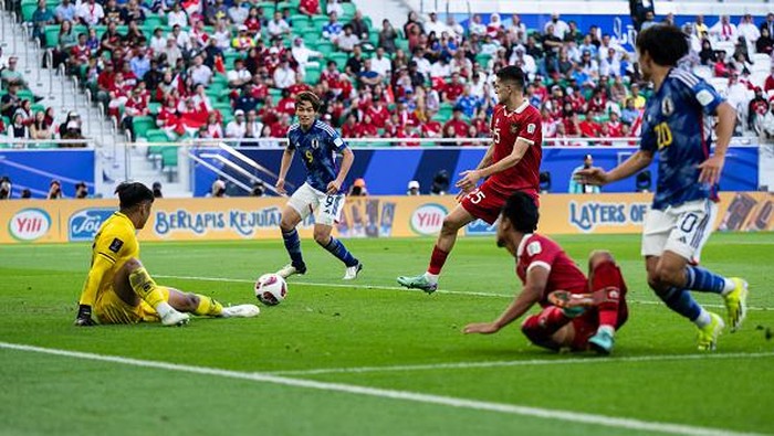 DOHA, QATAR - JANUARY 24:  of Japan scores his teams second goal during the AFC Asian Cup Group D match between Japan and Indonesia at Al Thumama Stadium on January 24, 2024 in Doha, Qatar. (Photo by Markus Gilliar - GES Sportfoto/Getty Images)