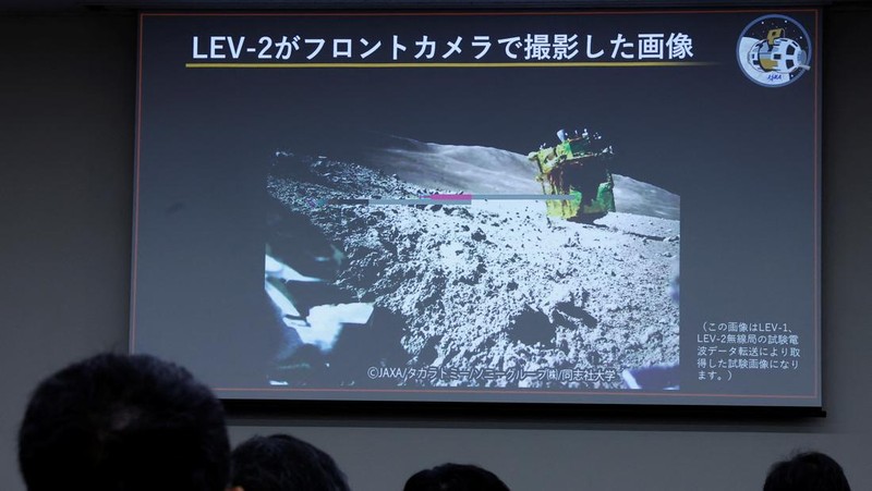 Hitoshi Kuninaka, Daichi Hirano, Masatsugu Otsuki and  Shinichiro Sakai from the Japan Aerospace Exploration Agency (JAXA), sit in front of a screen showing an image taken by LEV-2 on the moon, during a press conference on SLIM’s moon landing mission, in Tokyo, Japan January 25, 2024.   REUTERS/Kim Kyung-Hoon
