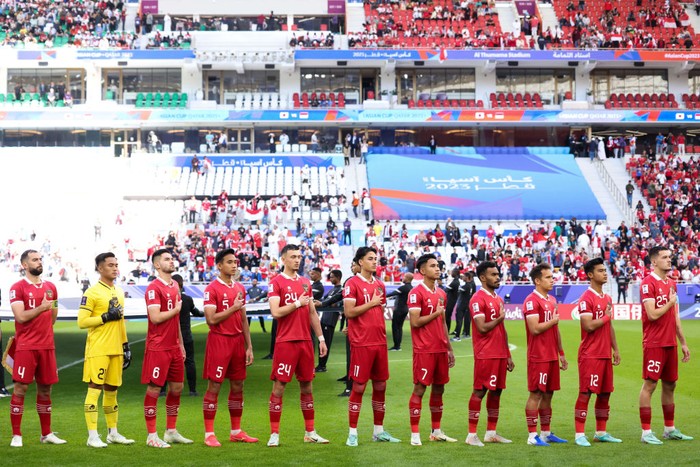 DOHA, QATAR - JANUARY 24: Players of Indonesia line up for team photo during the AFC Asian Cup Group D match between Japan and Indonesia at Al Thumama Stadium on January 24, 2024 in Doha, Qatar. (Photo by Zhizhao Wu/Getty Images)