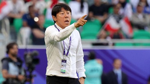 Indonesias South Korean coach Shin Tae-yong gestures during the Qatar 2023 AFC Asian Cup Group D football match between Japan and Indonesia at al-Thumama Stadium in Doha on January 24, 2024. (Photo by Giuseppe CACACE / AFP) / The erroneous mention[s] appearing in the metadata of this photo by Giuseppe CACACE has been modified in AFP systems in the following manner: [Indonesias South Korean coach Shin Tae-yong] instead of [Japans coach Hajime Moriyasu]. Please immediately remove the erroneous mention[s] from all your online services and delete it (them) from your servers. If you have been authorized by AFP to distribute it (them) to third parties, please ensure that the same actions are carried out by them. Failure to promptly comply with these instructions will entail liability on your part for any continued or post notification usage. Therefore we thank you very much for all your attention and prompt action. We are sorry for the inconvenience this notification may cause and remain at your disposal for any further information you may require.