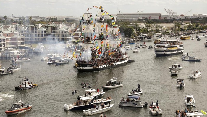 Some of the hundreds of boats that packed into the channel to watch the Gasparilla invasion and parade on Saturday, Jan. 27, 2024, in Tampa. (Luis Santana/Tampa Bay Times via AP)