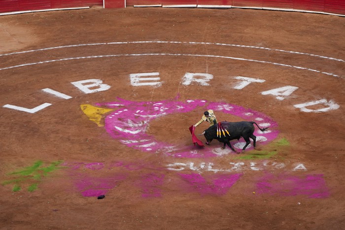 Spectators wait for a bullfight at the Plaza Mexico, in Mexico City, Sunday, Jan. 28, 2024. Bullfighting returned to Mexico City after the Supreme Court of Justice overturned a 2022 ban that prevented these events from taking place in the capital. (AP Photo/Fernando Llano)