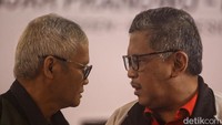 Tak sendiri, ia didampingi politisi PDIP Aria Bima.