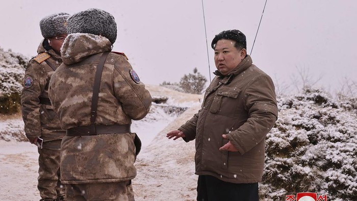 In this photo provided by the North Korean government, North Korean leader Kim Jong Un, right, inspects what it says a test firing of Pulhwasal-3-31 in North Korea Sunday, Jan. 28, 2024. Independent journalists were not given access to cover the event depicted in this image distributed by the North Korean government. The content of this image is as provided and cannot be independently verified. Korean language watermark on image as provided by source reads: 