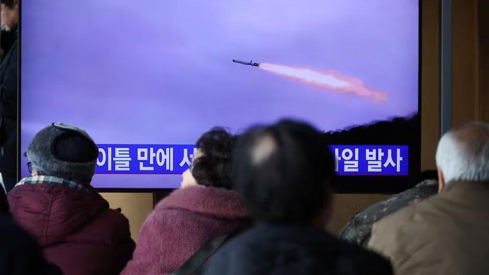 People watch a TV broadcasting a news report on North Korea firing multiple unidentified cruise missiles into the sea off its west coast, at a railway station in Seoul, South Korea, January 30, 2024. REUTERS/Kim Hong-Ji Acquire Licensing Rights