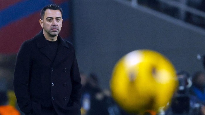 Barcelonas head coach Xavi Hernandez reacts during a Spanish La Liga soccer match between Barcelona and Villarreal at the Olimpic Lluis Companys stadium in Barcelona, Spain, Saturday, Jan. 27, 2024. (AP Photo/Joan Monfort)
