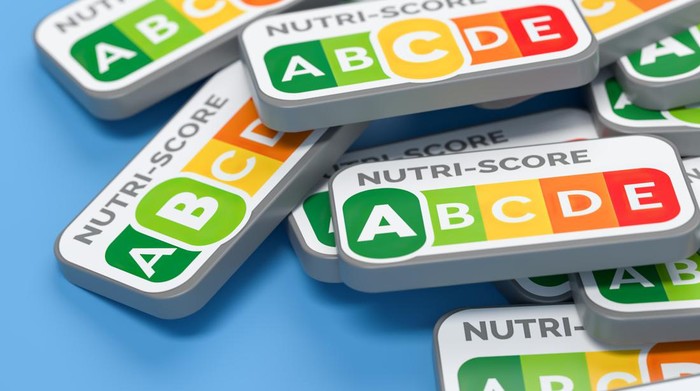 A heap of Labels A B C and D of the nutrition labelling system Nutri-Score being used in most of the countries of Western Europe.