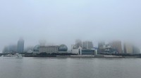 Begini penampakan kota Shanghai yang berselimut kabut pekat, Rabu (31/1/2024).