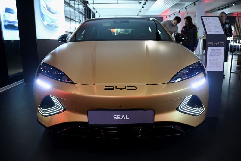 The logo of the BYD Auto company is seen on a BYD HAN electric vehicle during a BYD store opening at the car dealership Sternauto in Berlin, Germany January 31, 2024.  REUTERS/Annegret Hilse