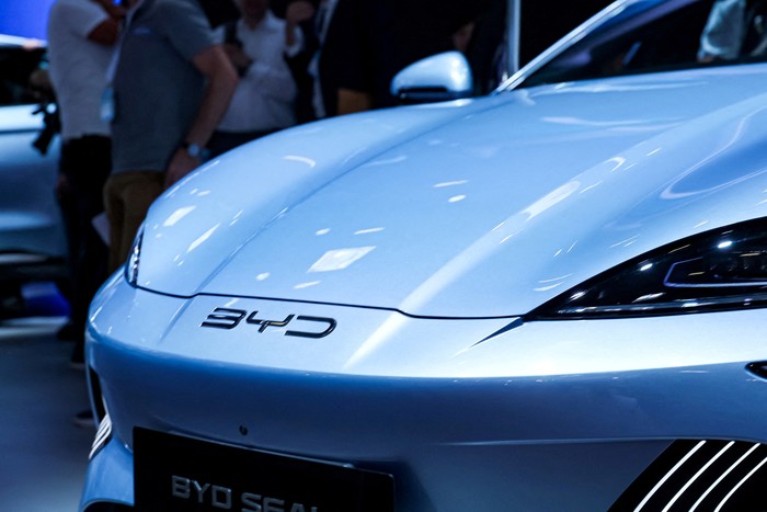 The logo of the BYD Auto company is seen on a BYD HAN electric vehicle during a BYD store opening at the car dealership Sternauto in Berlin, Germany January 31, 2024.  REUTERS/Annegret Hilse