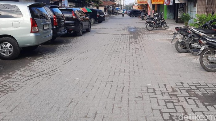 Jalan Pasar Pringgan yang rusak sudah diperbaiki. (Felicia Gisela Br Sihite/detikSumut)