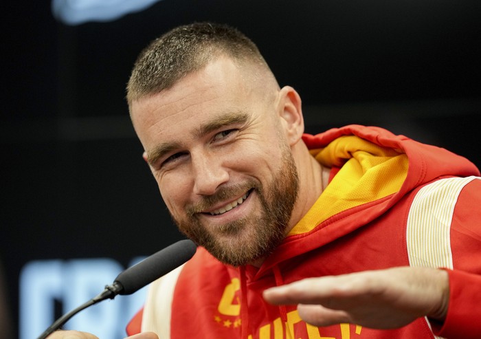 Kansas City Chiefs tight end Travis Kelce (87) works out before the AFC Championship NFL football game against the Baltimore Ravens, Sunday, Jan. 28, 2024, in Baltimore. (AP Photo/Nick Wass)
