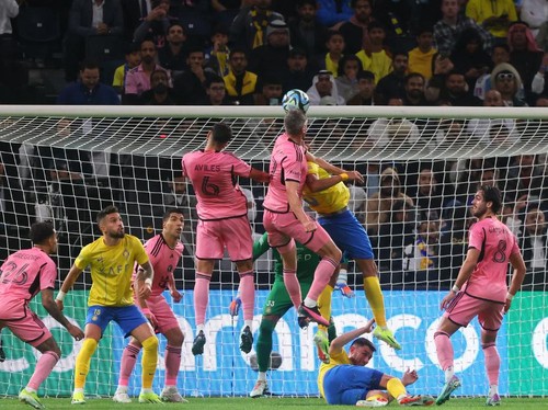 Inter Miamis Ukrainian defender #27 Sergii Kryvtsov leaps to head the ball during the friendly football match between Saudi Arabias al-Nassr FC and the US Inter Miami CF at the Kingdom Arena Stadium in Riyadh on February 1, 2024. (Photo by Fayez NURELDINE / AFP)
