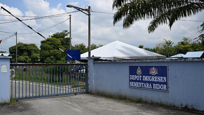 An entrance to the Bidor immigration detention centre is pictured in Bidor in Malaysias northern Perak state on February 2, 2024. More than 100 Rohingya refugees escaped a detention centre in Malaysia after a riot broke out, with one man killed after being hit by a vehicle on a highway as he fled, police said February 2. (Photo by Mohd RASFAN / AFP)