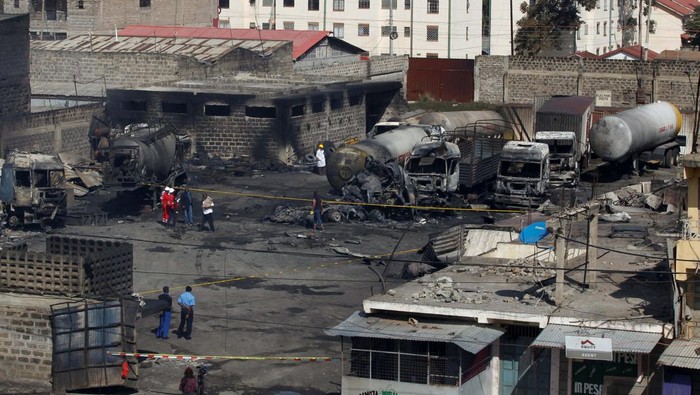Sisa-sisa Ledakan Hebat di Kenya yang Lukai Ratusan Orang A view of a burned gas cylinder near the scene of an explosion at a makeshift gas cylinder refilling depot in Mradi estate, Embakasi district, in Nairobi, Kenya, February 2, 2024. REUTERS/Monicah Mwangi