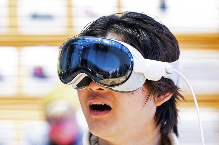 Mohamed Jawad shows off his Vision Pro headset on the first day of sales at a Palo Alto, Calif., Apple Store on Friday, Feb. 2, 2024. Jawad, who described himself as an 