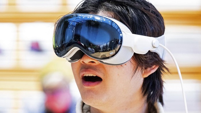 Mohamed Jawad shows off his Vision Pro headset on the first day of sales at a Palo Alto, Calif., Apple Store on Friday, Feb. 2, 2024. Jawad, who described himself as an 