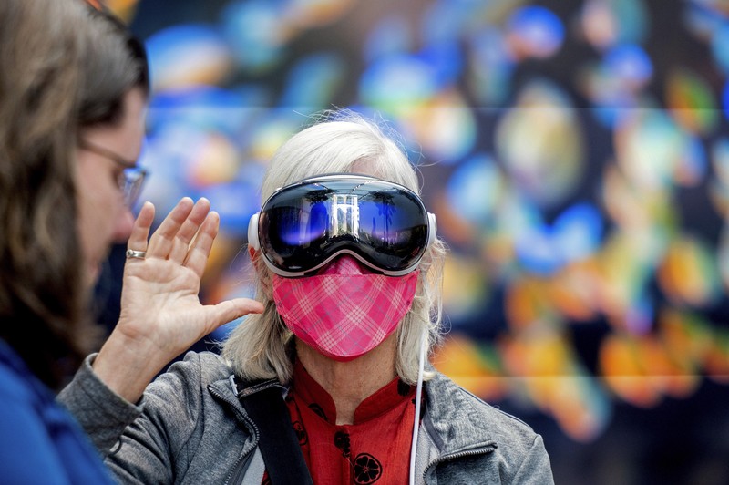 Mohamed Jawad shows off his Vision Pro headset on the first day of sales at a Palo Alto, Calif., Apple Store on Friday, Feb. 2, 2024. Jawad, who described himself as an 