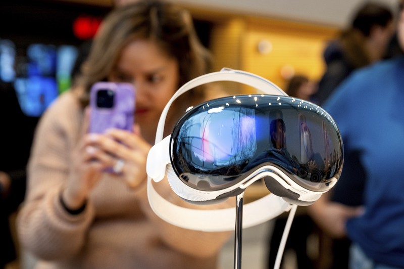 Mohamed Jawad shows off his Vision Pro headset on the first day of sales at a Palo Alto, Calif., Apple Store on Friday, Feb. 2, 2024. Jawad, who described himself as an 