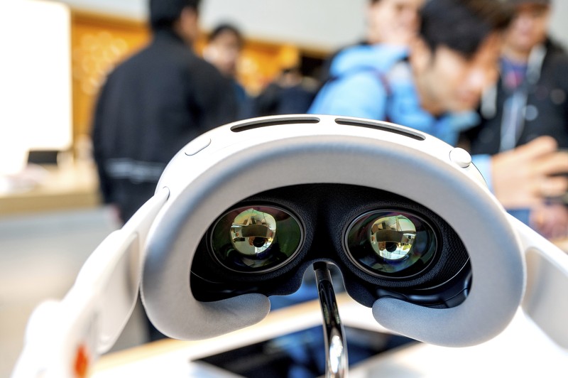 Mohamed Jawad shows off his Vision Pro headset on the first day of sales at a Palo Alto, Calif., Apple Store on Friday, Feb. 2, 2024. Jawad, who described himself as an 