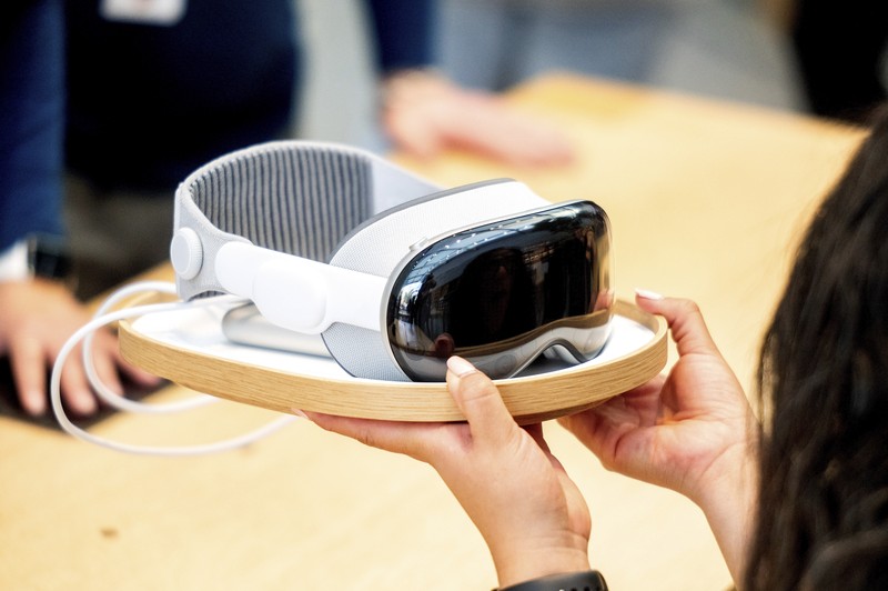 Mohamed Jawad shows off his Vision Pro headset on the first day of sales at a Palo Alto, Calif., Apple Store on Friday, Feb. 2, 2024. Jawad, who described himself as an 