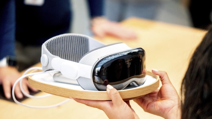 Mohamed Jawad shows off his Vision Pro headset on the first day of sales at a Palo Alto, Calif., Apple Store on Friday, Feb. 2, 2024. Jawad, who described himself as an 