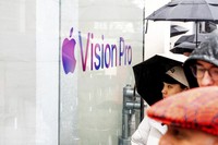 Mohamed Jawad shows off his Vision Pro headset on the first day of sales at a Palo Alto, Calif., Apple Store on Friday, Feb. 2, 2024. Jawad, who described himself as an 