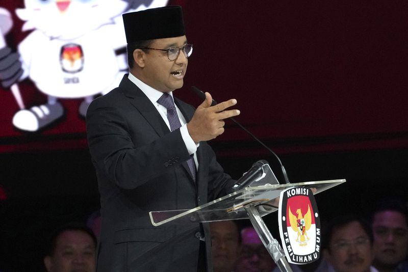 Presidential candidate Anies Baswedan speaks during the fourth presidential candidates' debate in Jakarta, Indonesia Sunday, Feb. 4, 2024. The world's third-largest democracy is scheduled to hold its legislative and presidential elections on Feb. 14. (AP Photo/Tatan Syuflana)
