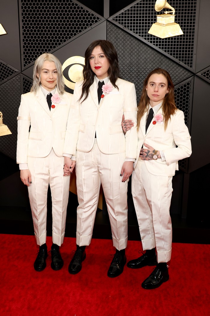 LOS ANGELES, CALIFORNIA - FEBRUARY 04: (L-R) Phoebe Bridgers, Lucy Dacus and Julien Baker attend the 66th GRAMMY Awards at Crypto.com Arena on February 04, 2024 in Los Angeles, California. (Photo by Matt Winkelmeyer/Getty Images for The Recording Academy)