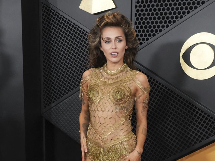 Miley Cyrus arrives at the 66th annual Grammy Awards on Sunday, Feb. 4, 2024, in Los Angeles. (Photo by Jordan Strauss/Invision/AP)