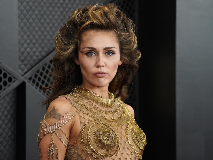 Miley Cyrus arrives at the 66th annual Grammy Awards on Sunday, Feb. 4, 2024, in Los Angeles. (Photo by Jordan Strauss/Invision/AP)