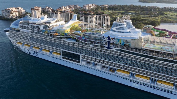 MIAMI, FLORIDA - FEBRUARY 03: In an aerial view, Royal Caribbean's Icon of the Seas, billed as the world's largest cruise ship, is moored at PortMiami after returning from its maiden voyage on February 03, 2024, in Miami, Florida. The 1,197-foot long ship cost $1.79 billion to build, has 20 decks, and can hold a maximum of 7,600 people. (Photo by Joe Raedle/Getty Images)