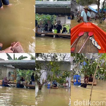 Foto acara pernikahan Sa'adah dan Saidi, walaupun banjir resepsi tetap digelar. Acara pernikahan tersebut langsung viral.