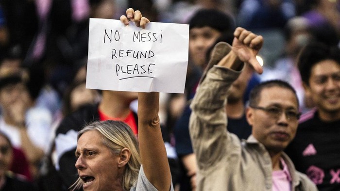 A damaged paper model of Inter Miamis Lionel Messi during the friendly soccer match between Hong Kong Team and US Inter Miami CF at the Hong Kong Stadium in Hong Kong, Sunday, Feb. 4, 2024. Messis non-appearance was a disappointment for the fans who snapped up all 40,000 tickets at Hong Kong Stadium within an hour when they went on sale in December. (AP Photo/Louise Delmotte)