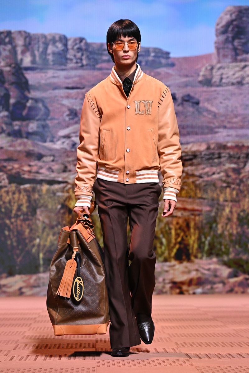 PARIS, FRANCE - JANUARY 16: (EDITORIAL USE ONLY - For Non-Editorial use please seek approval from Fashion House) A model walks the runway during the Louis Vuitton Menswear Fall/Winter 2024-2025 show as part of Paris Fashion Week on January 16, 2024 in Paris, France. (Photo by Stephane Cardinale - Corbis/Corbis via Getty Images)