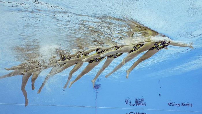Artistic Swimming - World Aquatics Championships - Aspire Dome, Doha, Qatar - February 5, 2024  Canada perform during the team technical preliminary round REUTERS/Clodagh Kilcoyne