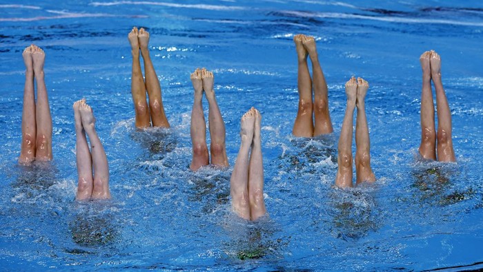 Artistic Swimming - World Aquatics Championships - Aspire Dome, Doha, Qatar - February 5, 2024  Canada perform during the team technical preliminary round REUTERS/Clodagh Kilcoyne